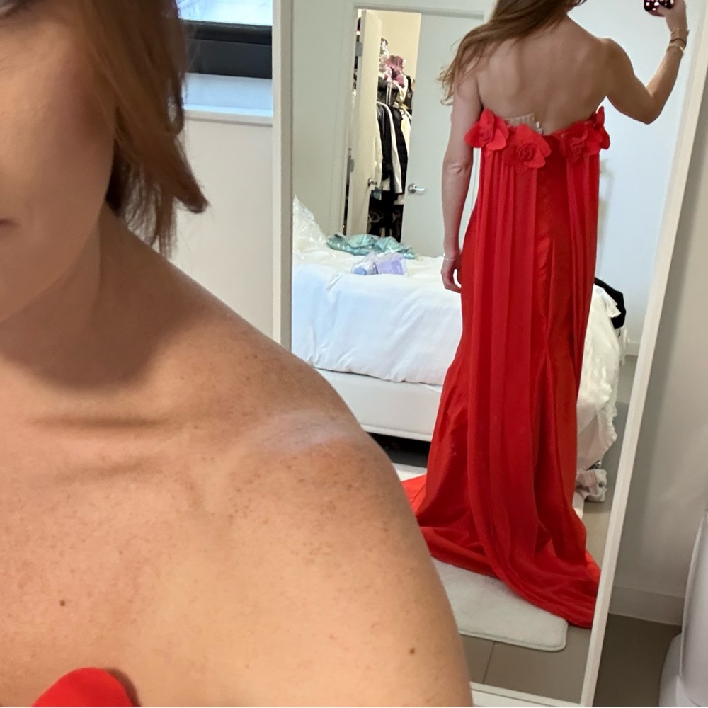 Elegant Red Strapless Gown with Floral Accents